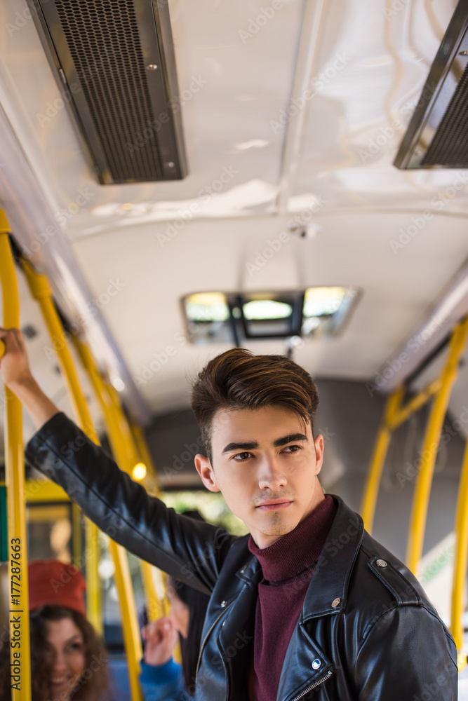 Naklejka premium handsome man in bus