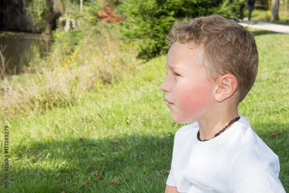 Portrait of a cute kid outdoor enjoying nature Portrait of a cute kid outdoor enjoying nature