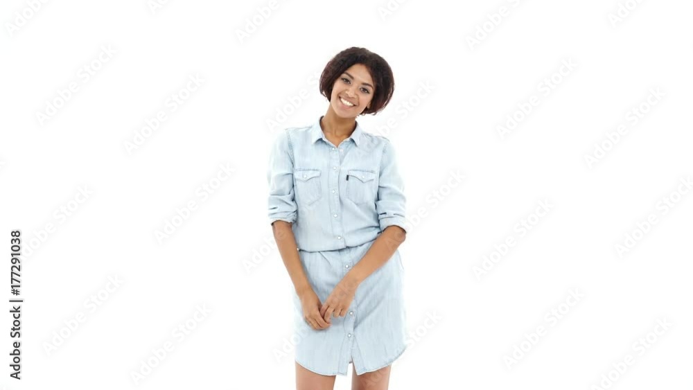 Young pretty african woman showing peace gesture Young pretty african woman showing peace gesture