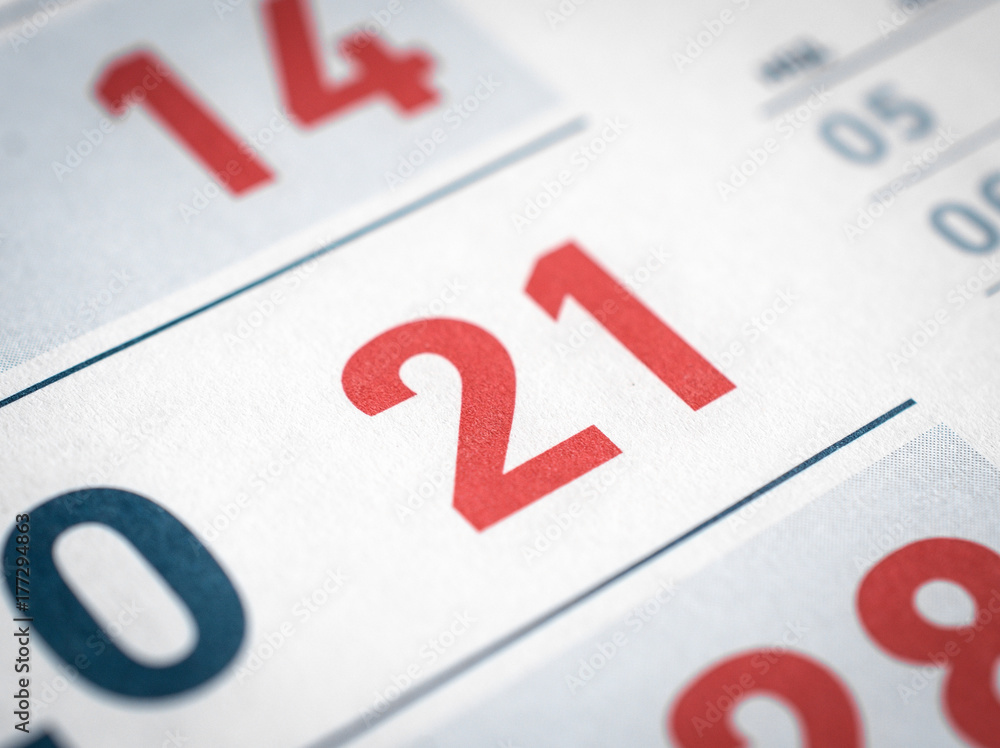calendar close up. the twenty-first red number in focus calendar close up. the twenty-first red number in focus