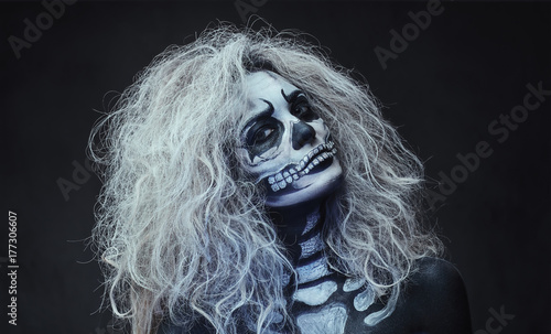 Halloween female skull makeup.