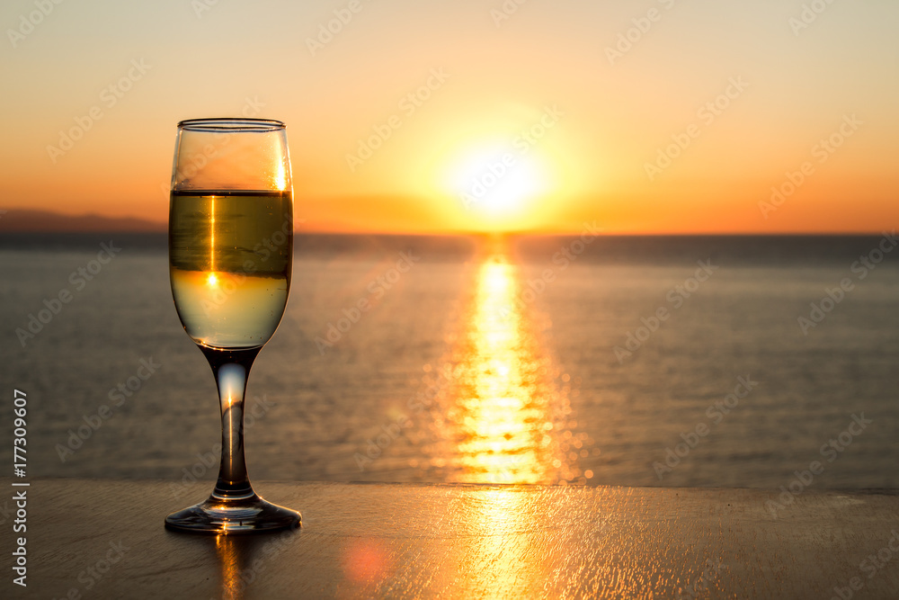 Sun path on the water, afternoon, one, single wineglass