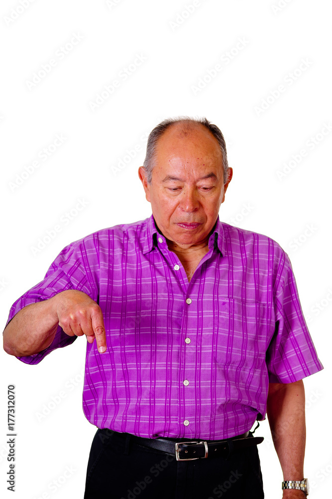 Portrait of a happy old man, pointing with his hand to down and wearing a purple square t-shirt in a white background Portrait of a happy old man, pointing with his hand to down and wearing a purple square t-shirt in a white background
