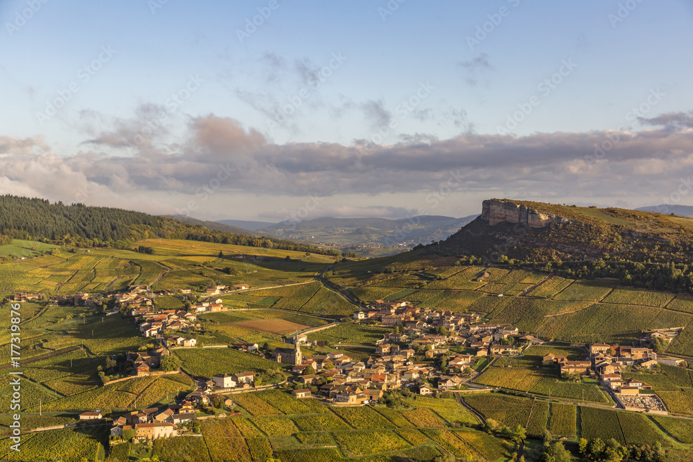 Fototapeta premium Aerial view of Vergisson village and rock in France