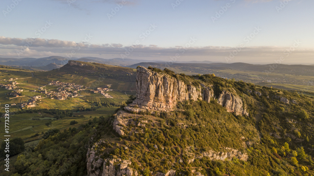 Obraz premium Aerial view of Solutre rock in Burgundy at sunrise, France