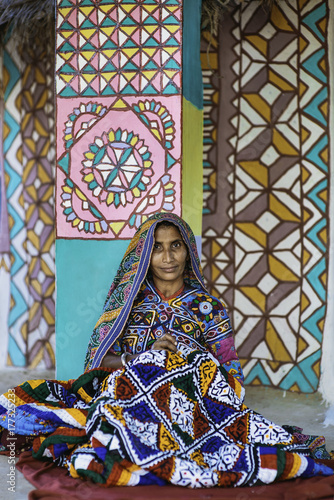 Meghwal Woman Embroidering Fabric Outside House. photo