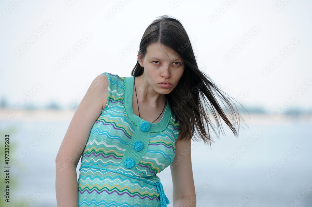 Pretty woman from Volgograd on the shore of the great Russian river Volga inflates her lips and shows her beautiful hair Pretty woman from Volgograd on the shore of the great Russian river Volga inflates her lips and shows her beautiful hair