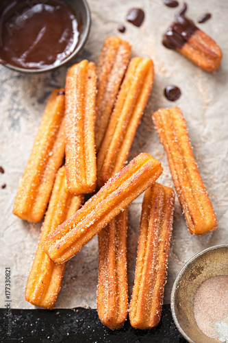 Churros with sugar and chocolate sauce 