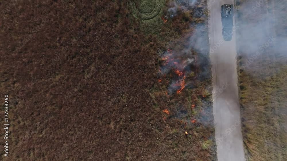 Controlled burn grass fire Controlled burn grass fire