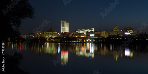 City of Albany lights and reflections on the Hudson River looking from the Renssalear docks in NY © cbell7153