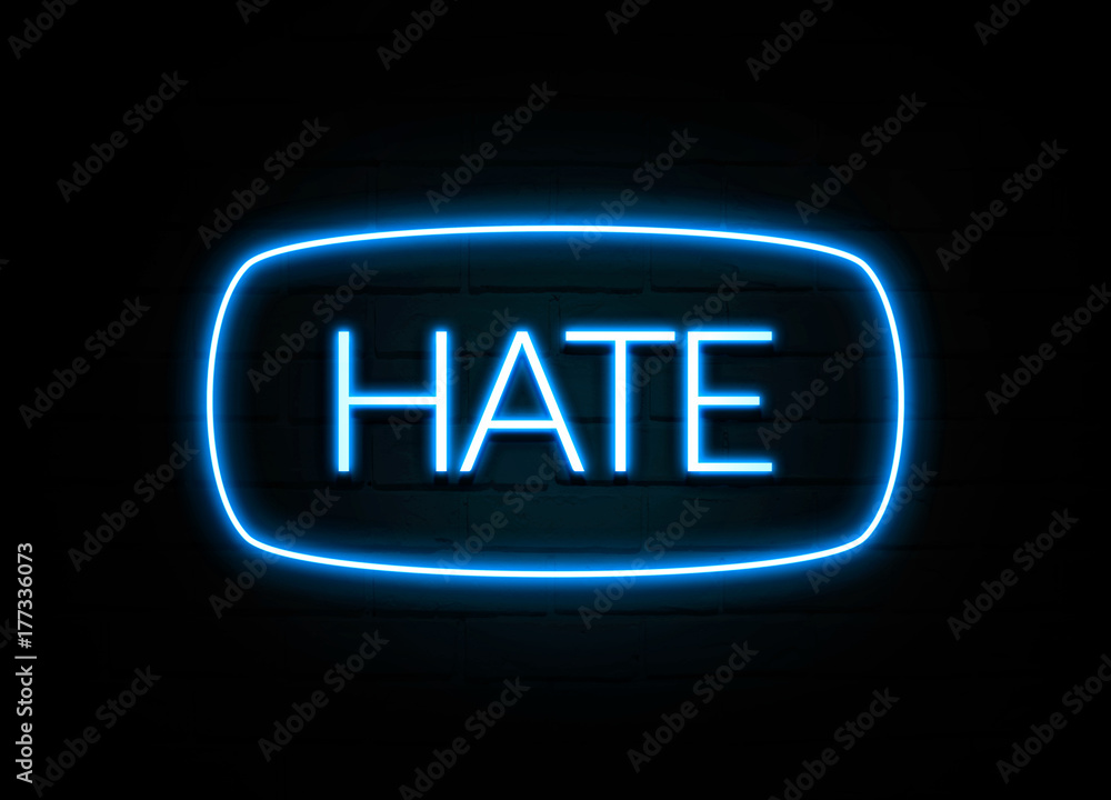 Hate - colorful Neon Sign on brickwall Hate - colorful Neon Sign on brickwall