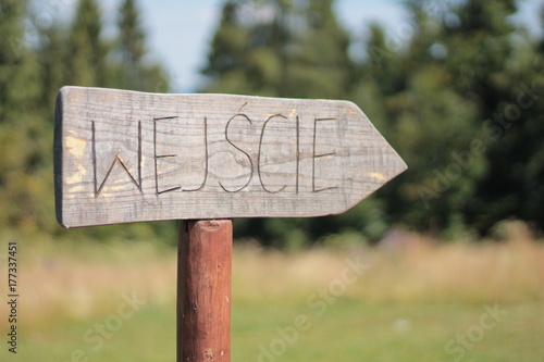 Drewniany znak wejścia