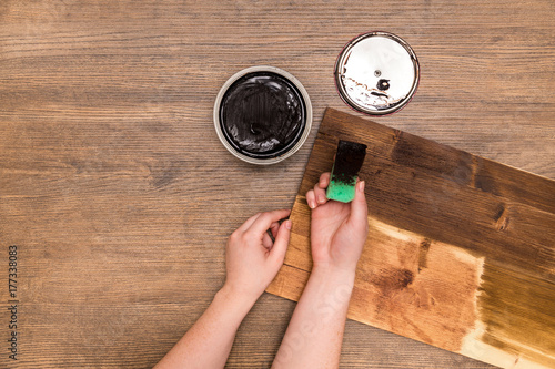 DIY dark wood wall with wax toning, background for photos photo