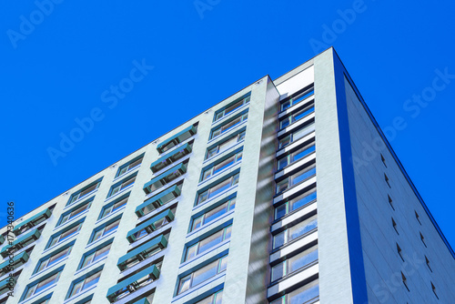 new apartment building on a blue sky background