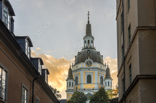 Katarina kyrka med det fina kyrktornet vid solnedgången photo