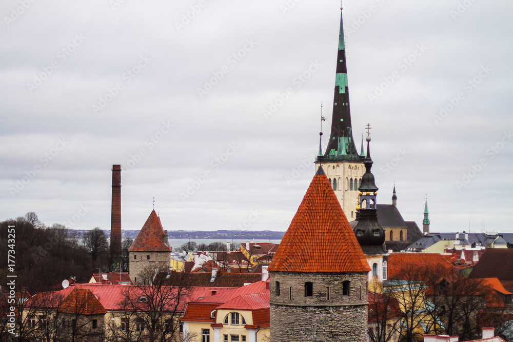 Fototapeta premium Church of St. Olav Tallinn and views of the Old Town with the Upper Town