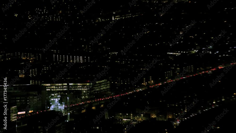 Panoramic aerial view of London city buildings & traffic illuminated at night Panoramic aerial view of London city buildings & traffic illuminated at night