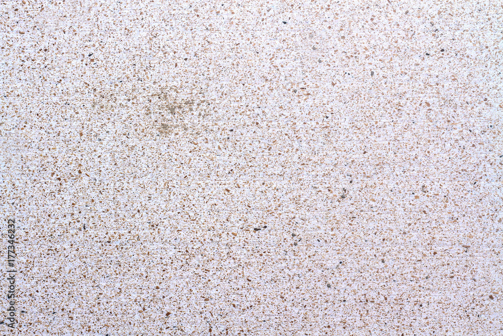 Light concrete structure walls interspersed with small stones Light concrete structure walls interspersed with small stones