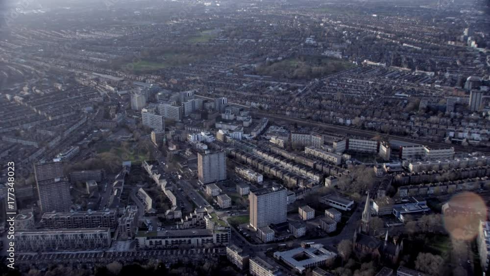 Aerial view over a London district with residential tower blocks & other housing Aerial view over a London district with residential tower blocks & other housing