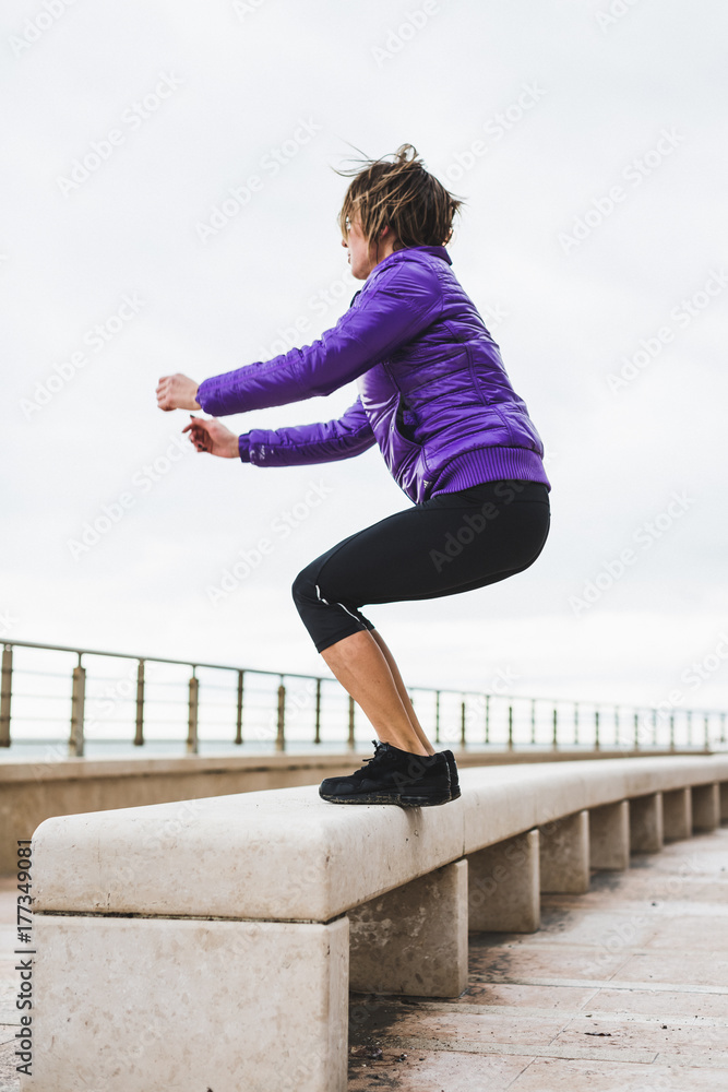 Athletic woman during workout outdoor Athletic woman during workout outdoor