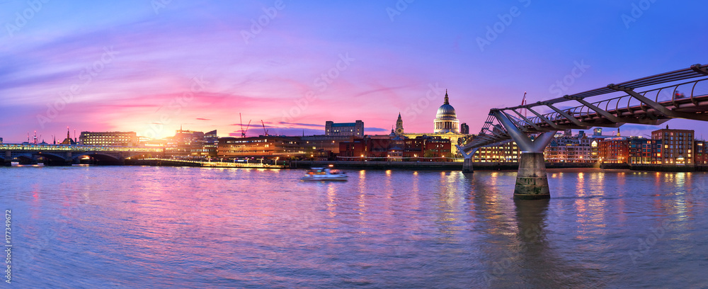 Illuminated London, view over Thames river from South Bank Ennbankment at sunset Illuminated London, view over Thames river from South Bank Ennbankment at sunset