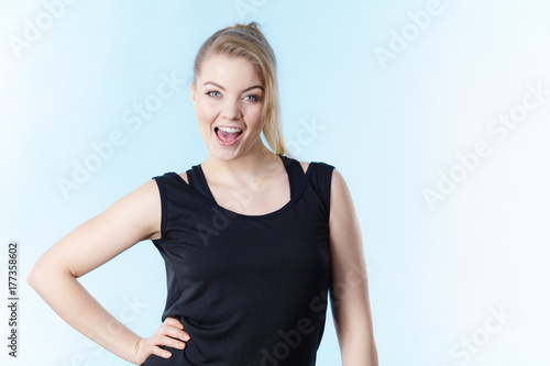 Happy woman wearing black tank top