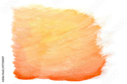 Color orange splash watercolor hand painted on white background, artistic decoration or background .