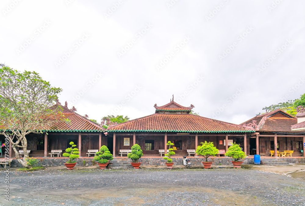 Long An, Vietnam - October 15th, 2017: Architectural beauty of the ancient temple in the countryside. Pagoda was built in 1808, recognized as a national cultural monument in 1997 in Long An, Vietnam