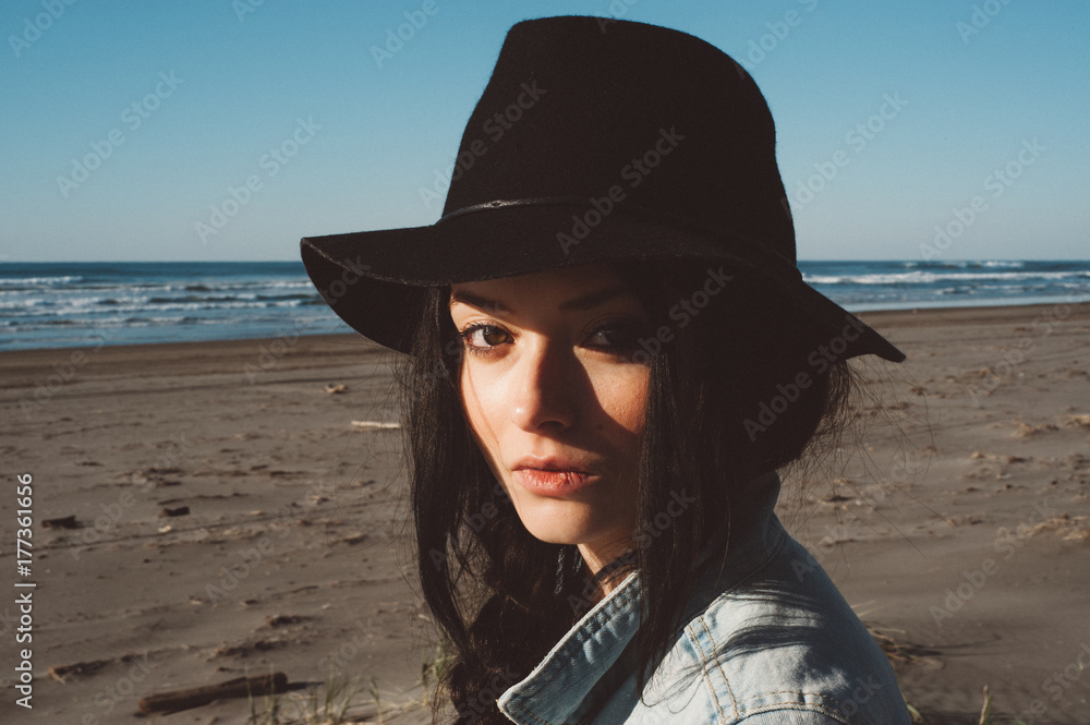Portrait of a Hip Young Woman on the Beach Portrait of a Hip Young Woman on the Beach