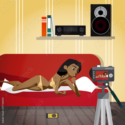 Young afro woman in her underwear leads an erotic broadcast. The