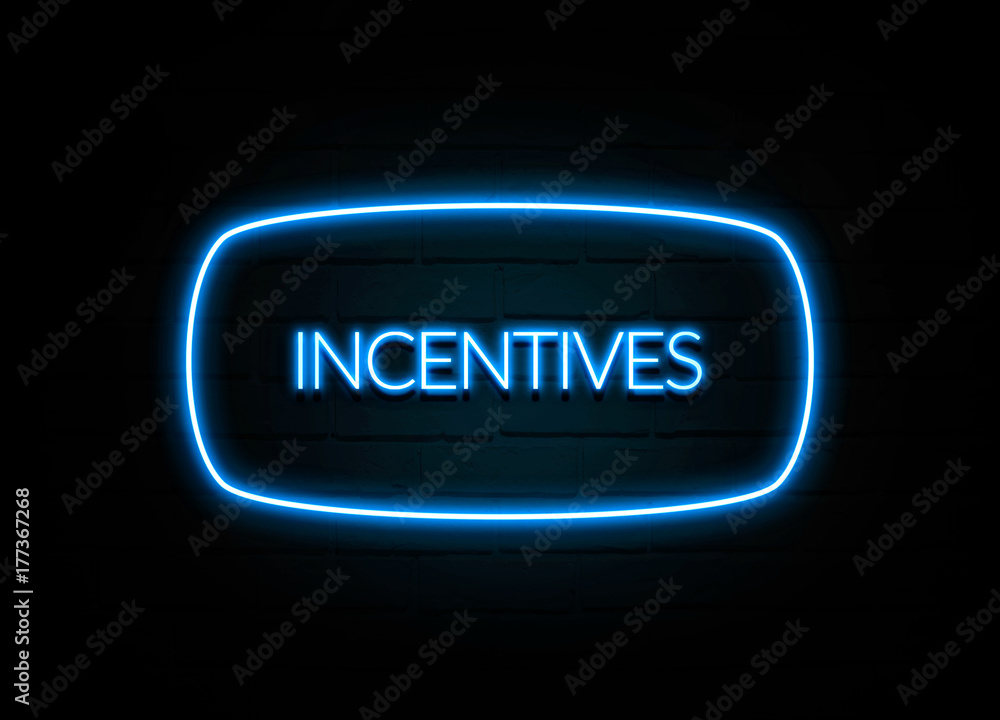 Incentives - colorful Neon Sign on brickwall Incentives - colorful Neon Sign on brickwall