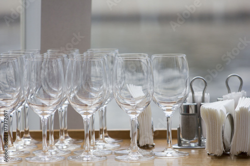 Glass glasses for wine standing on the table. Wine glass close-up