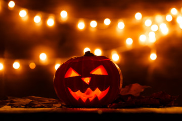Photo of halloween pumpkin cut in shape of face