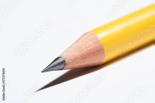 Macro shot of the point of a yellow pencil photo