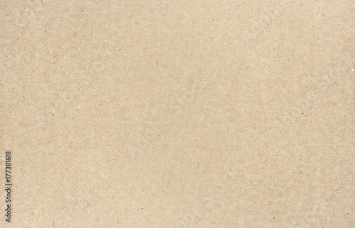 Smooth surface of brown carton or cardboard, background or texture of paper cardboard 