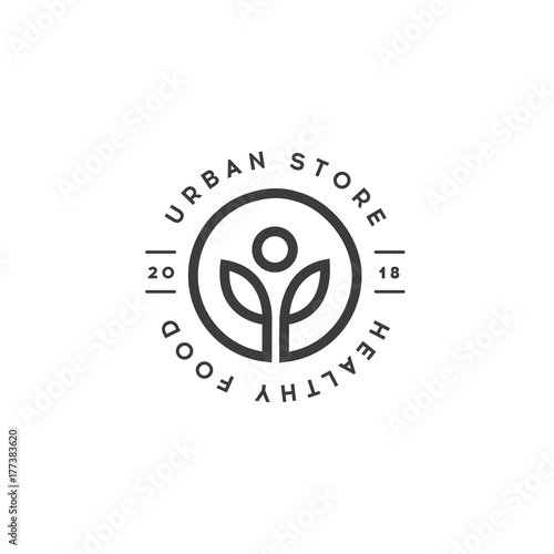 Healthy Food Store logo template. Urban Shop of Organic Food Vector symbol. Healthy lifestyle Vector Design element. Vegan cafe emblem.
