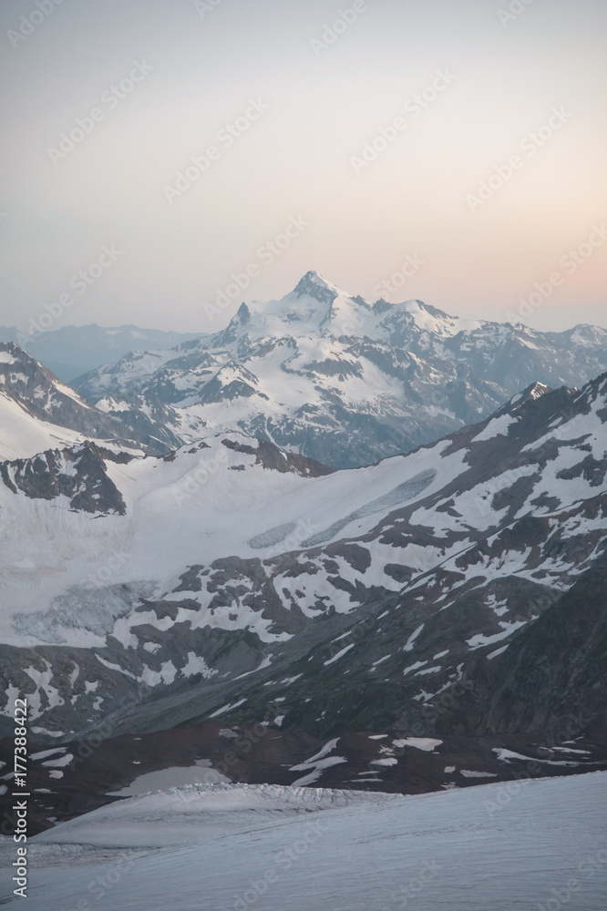 Sunset panorama of the elbrus and part of the Caucasian ridge