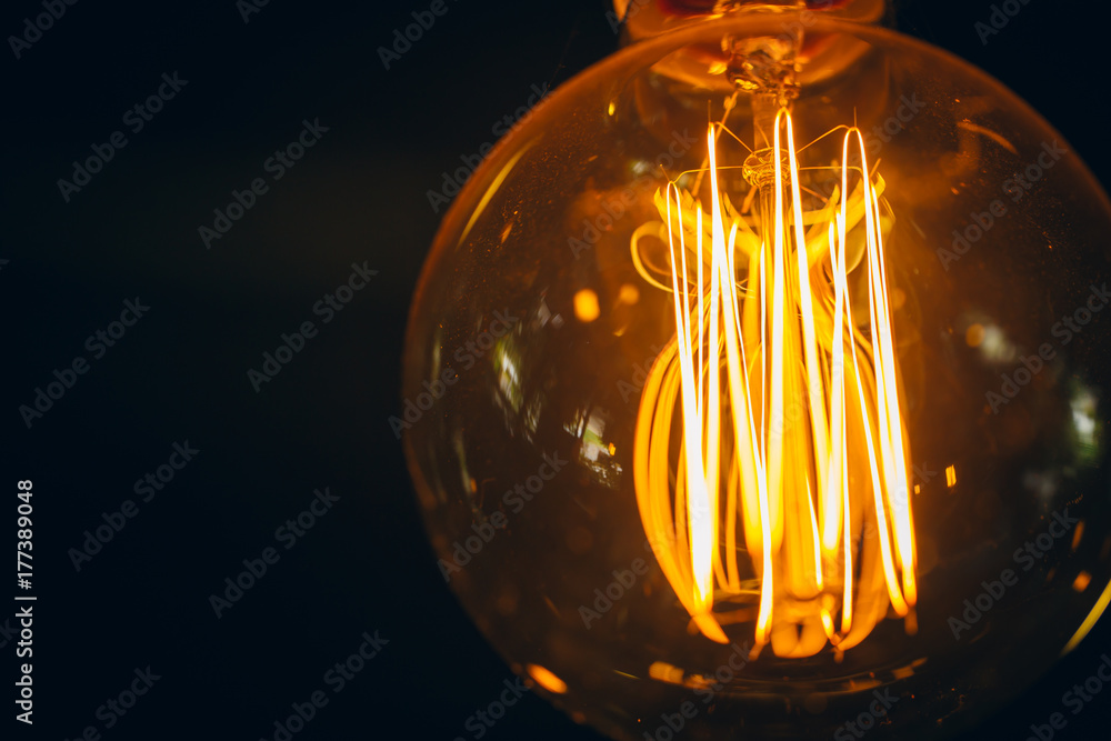 © Quality Stock Arts - light bulb closeup vintage retro style with space for text
