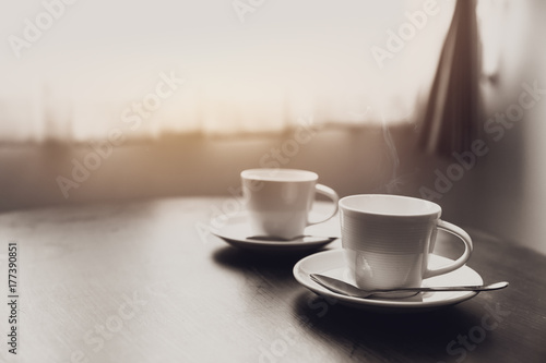 two coffee cups on table near windows morning romantic love concept