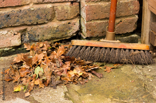 Sweeping up autumn leaves