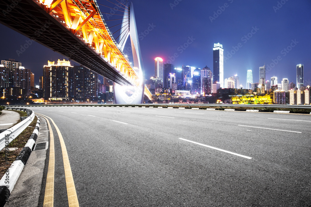 Fototapeta premium empty asphalt road with modern bridge and modern city