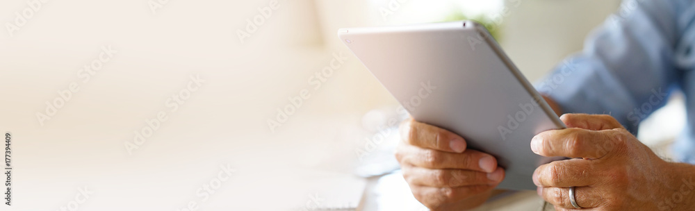 Closeup of digital tablet used by businessman- template - obrazy, fototapety, plakaty 