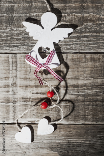 decoctive angel on a wooden background. christmas concept photo