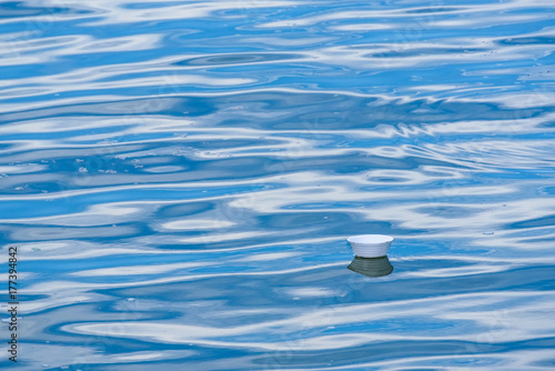 Plastic waste floating in the sea.