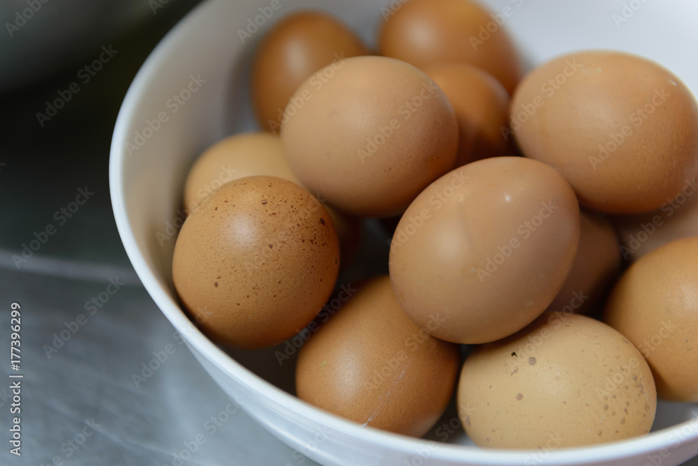 eggs in white bowl eggs in white bowl
