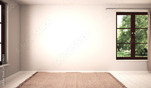 Leeres Zimmer mit 2 Fenstern und heller Wand photo