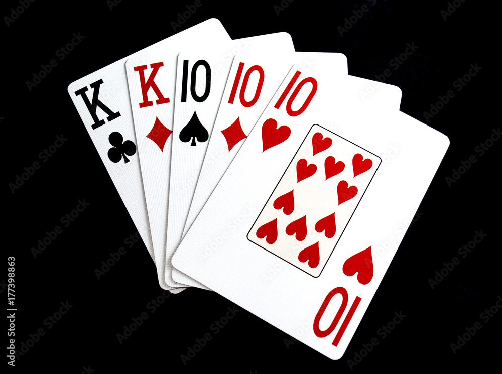 Obraz premium Poker Hand Full House on Black Background