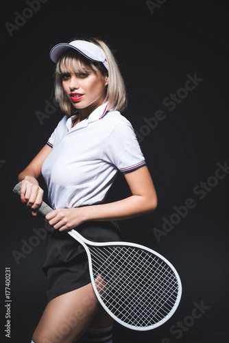 beautiful woman with tennis racket © LIGHTFIELD STUDIOS
