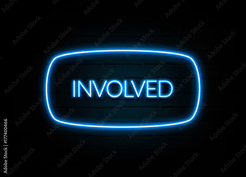 Involved  - colorful Neon Sign on brickwall