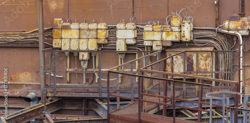 rusty industrial control cabinets photo